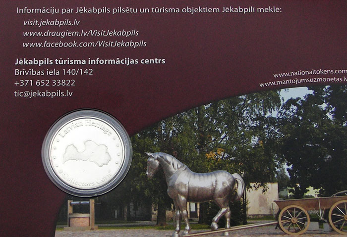 Skulptūra „Zirgs ar ratiem”
